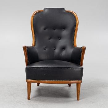 Carl Malmsten, a mahogany 'Vår Fru' armchair, Bodafors, 1964.
