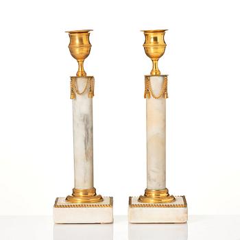 A pair of late Gustavian candlesticks.