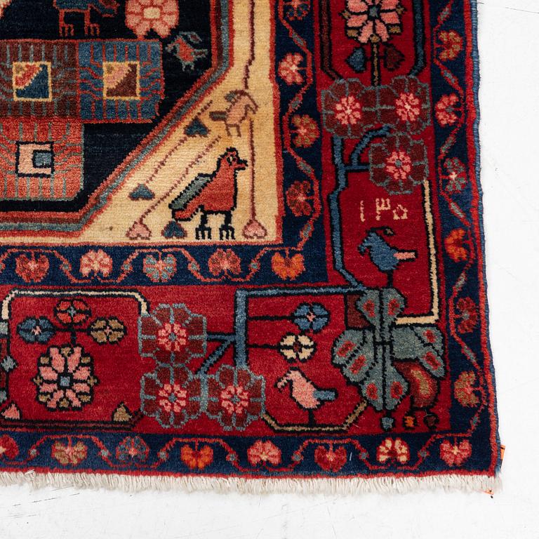 A oriental rug, c. 245 x 150 cm.