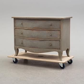 A 18th century rococo chest of drawers.