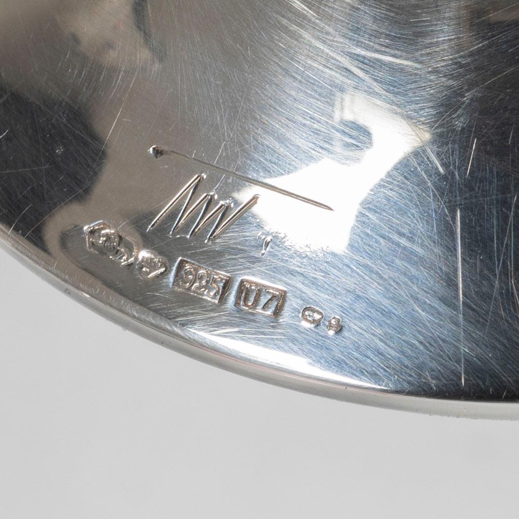 Tapio Wirkkala, Two Finnish sterling silver candlesticks, model 'Trumetti', marked TW, Kultakeskus, Hämeenlinna 1972 and 1974.