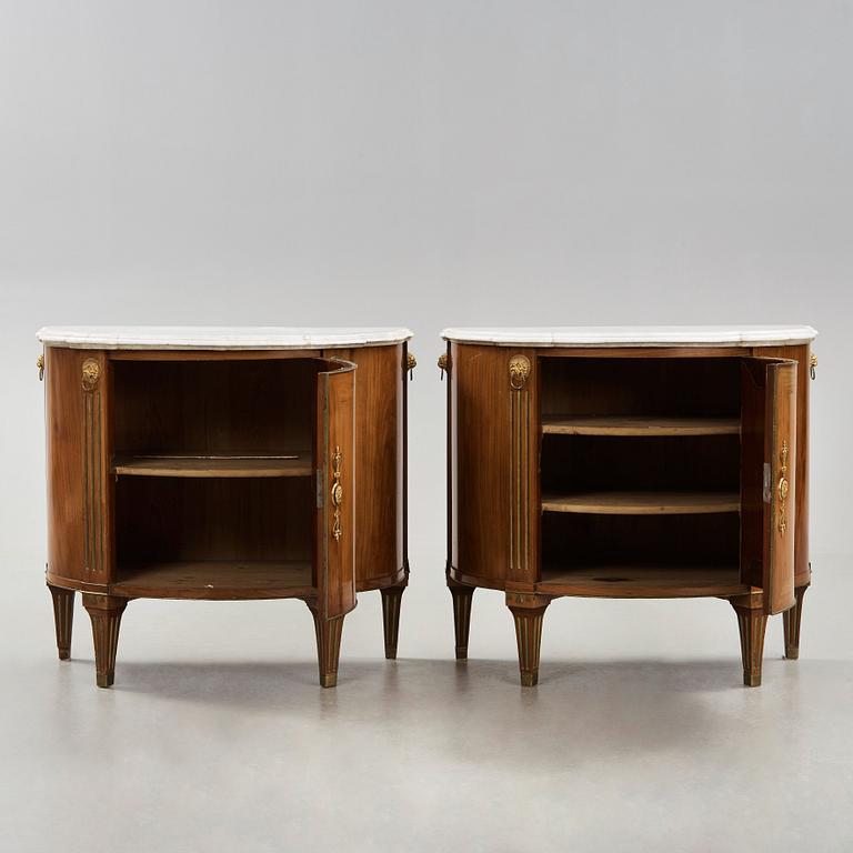 A pair of late Gustavian cupboards attributed to Gottlieb Iwersson (master in Stockholm 1778-1813), circa 1790.