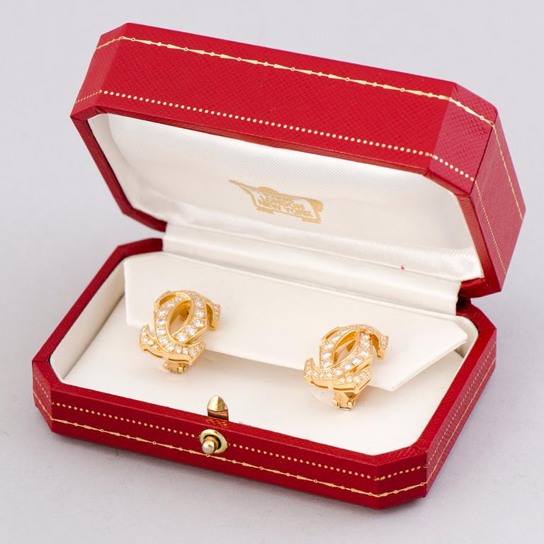 Cartier, A PAIR OF CARTIER EARRINGS, brilliant cut diamonds, 18K gold.