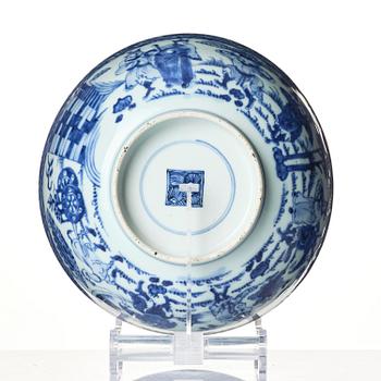 A blue and white 'foreigners bearing gifts' bowl, Qing dynasty, 18th century.