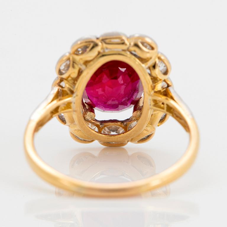 An 18K gold and platinum ring set with a faceted ruby weight ca 3.35 cts.