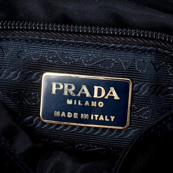 PRADA, a blue nylon and leather shoulder bag.
