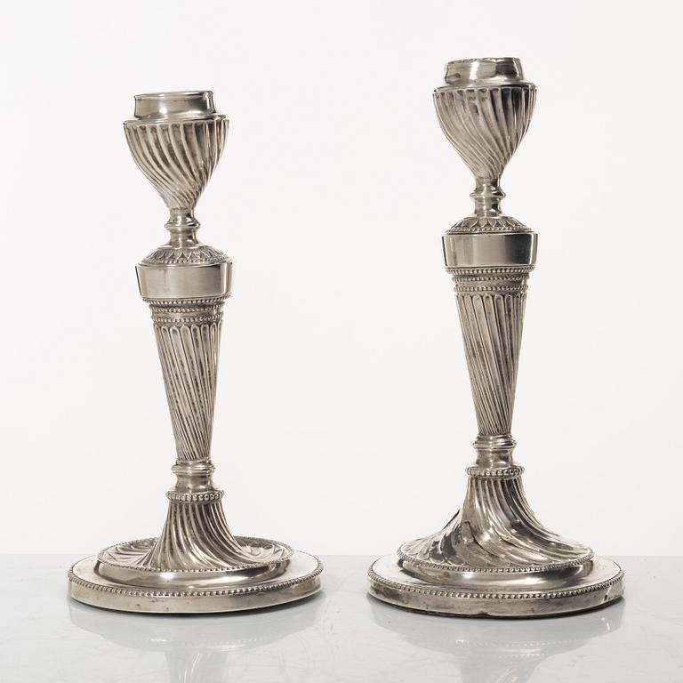 A pair of English silver candelabra, mark of Hawksworth, Eyre & Co Ltd, Sheffield 1892.