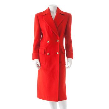 CÉLINE, a red cashmere and wool coat.