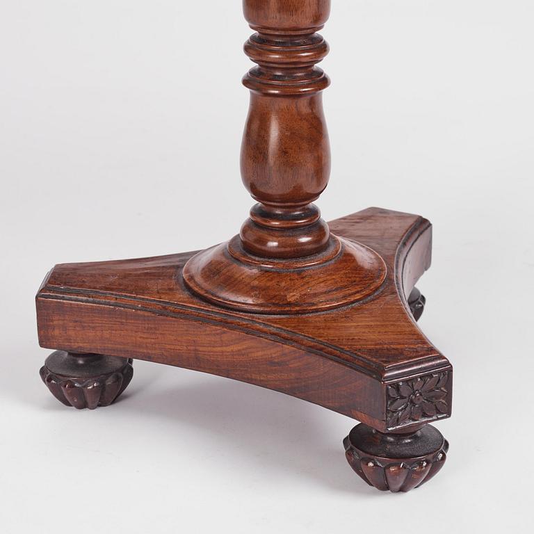 A near pair of Regency rosewood gueridon tables in the manner of Thomas Hope (1769-1831).