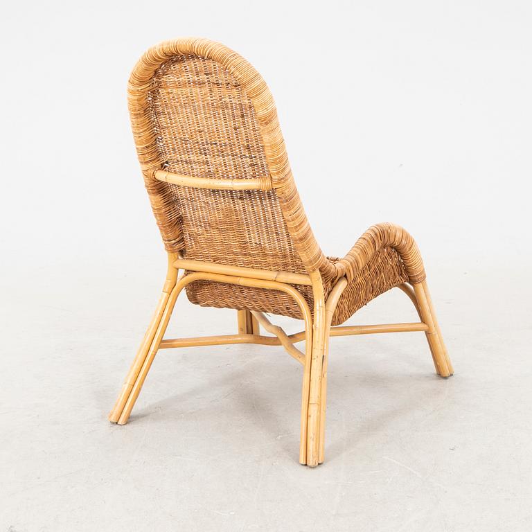 A bamboo and rattan armchair "Fogdö" from IKEA  and side table 21st century.