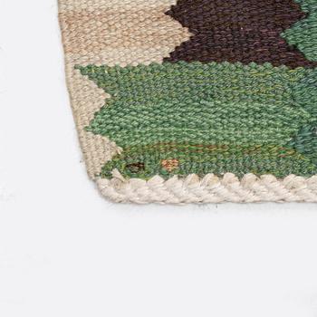 Barbro Nilsson, a carpet 'Nejlikan grön', flat weave, c. 390 x 278 cm, signed AB MMF BN.