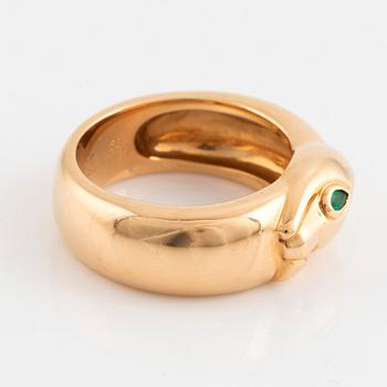 An 18K gold Cartier ring set with a tsavorite.