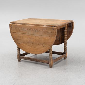 A pine gate-leg table, 18th/19th Century.
