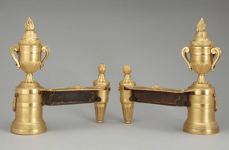 A pair of Louis XVI 18th Century bronze chenets.