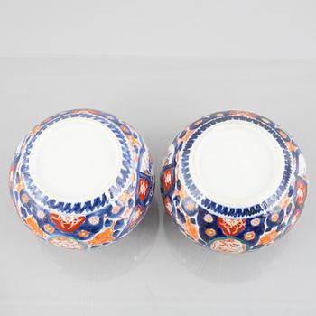 A dish and a pair of pots, porcelain, Japan, early 20th century.