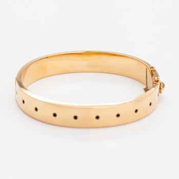 Kirsti Ilvessalo, An 18K gold and enamel bracelet. Westerback/Kalevala Koru, Helsinki 1959.