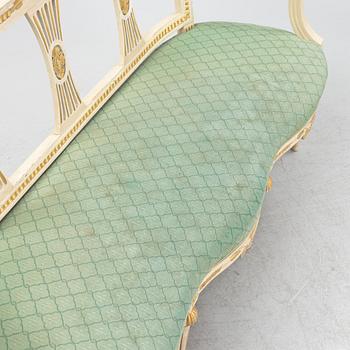 A painted and carved Gustavian style sofa, 1920's.