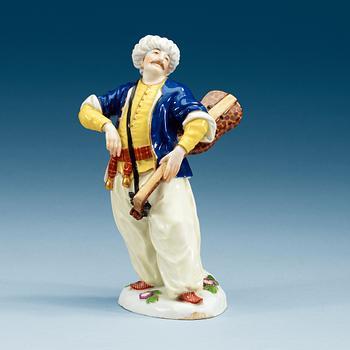 864. A Meissen figure of a Turkish musician, ca 1900.