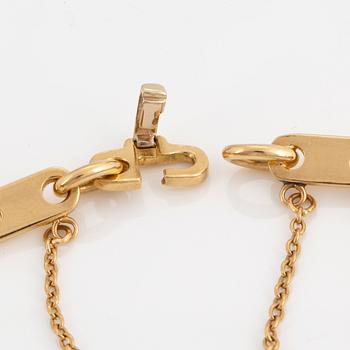 Cartier 18K gold charm bracelet.