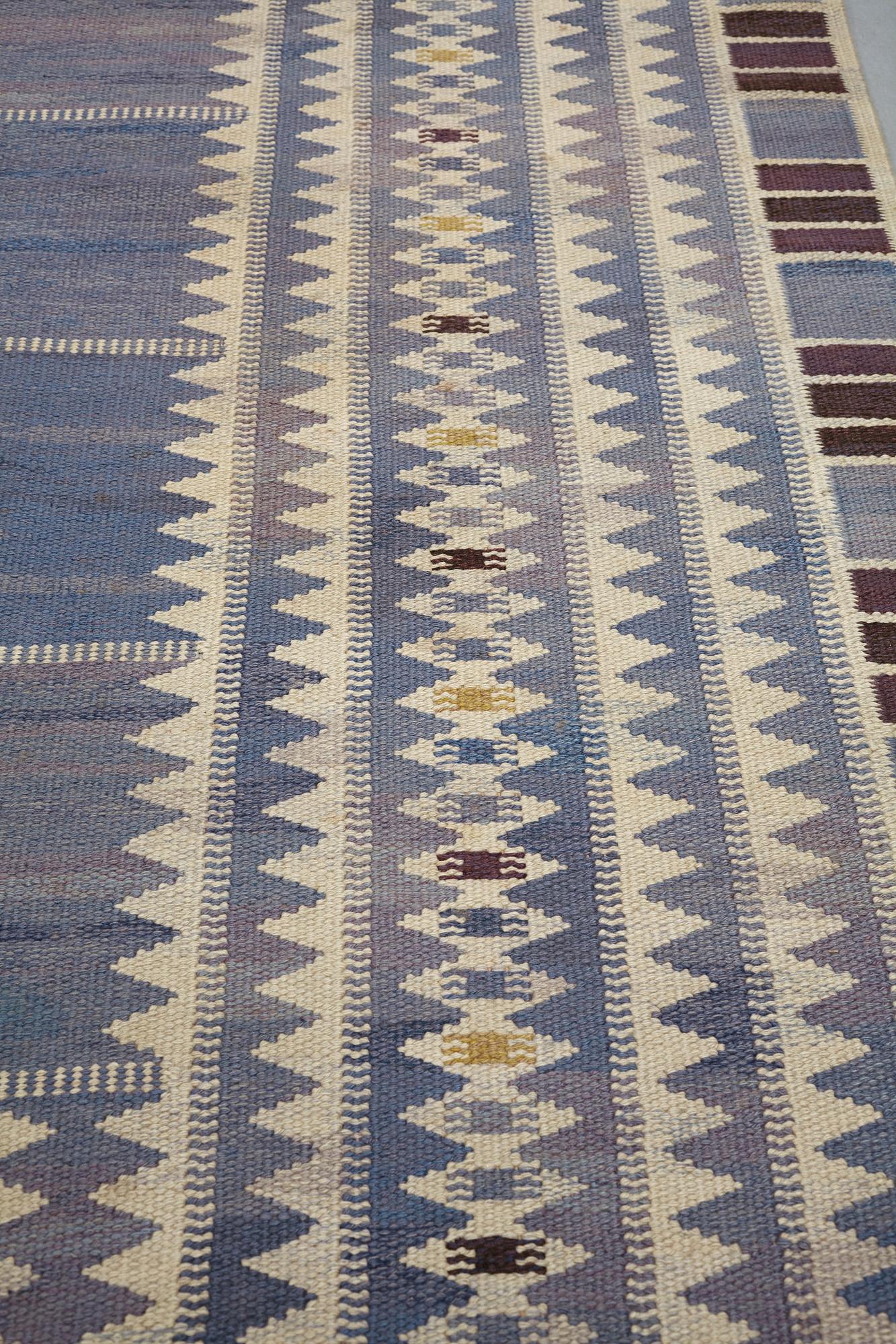 Barbro Nilsson, a carpet, "Salerno blå", flat weave, ca 312 x 201,5-205,5 cm, signed AB MMF BN.