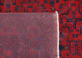 A Afghan fine carpet, 297 x 205 cm.