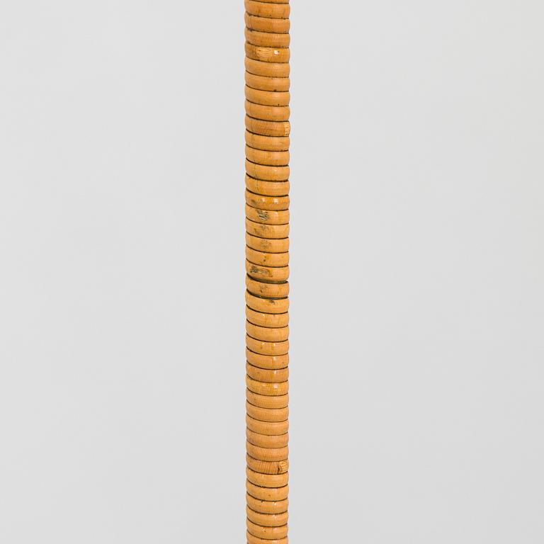Paavo Tynell, a pair of mid-20th century K10-10 floor lamps for Taito Finland.