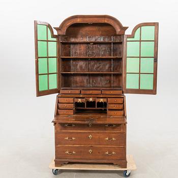 Slant-front secretary with a glazed section, 18th century.