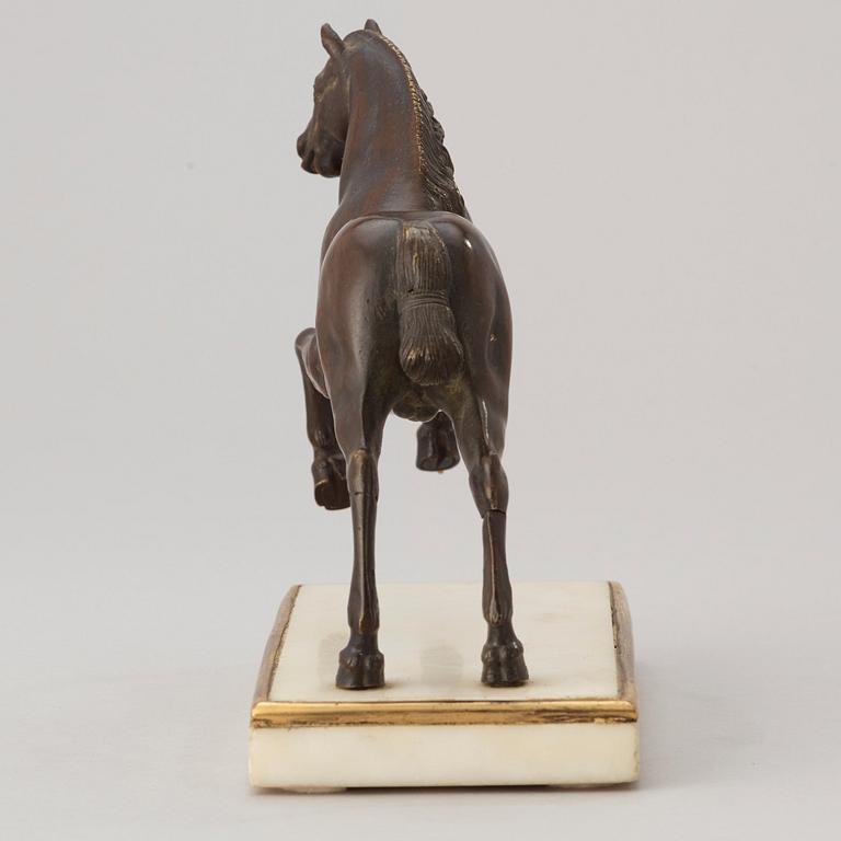 A Baroque 17th century bronze figure of a horse.