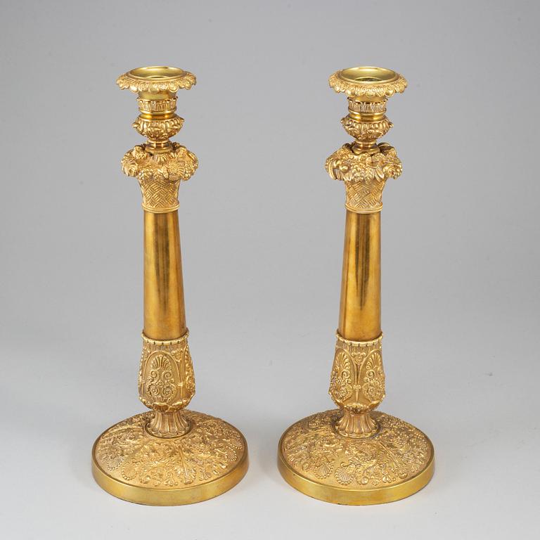 A pair of French Empire candlesticks, first half of the 19th century.