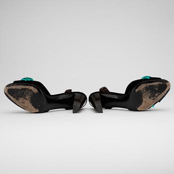 YVES SAINT LAURENT, a pair of brown velvet sandalettes.