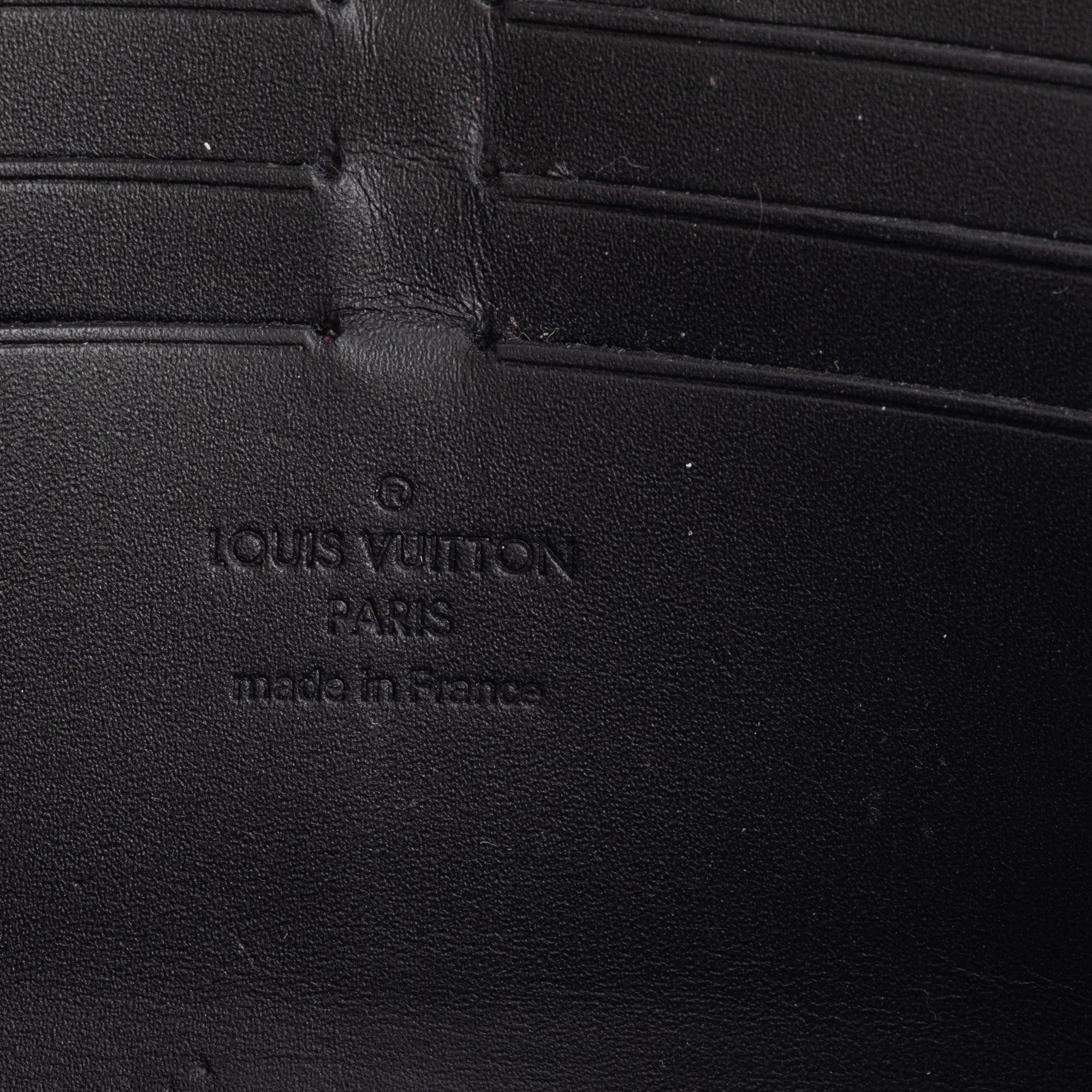 Louis Vuitton, A Suhali leather 'Le Favori Verone Wallet'.