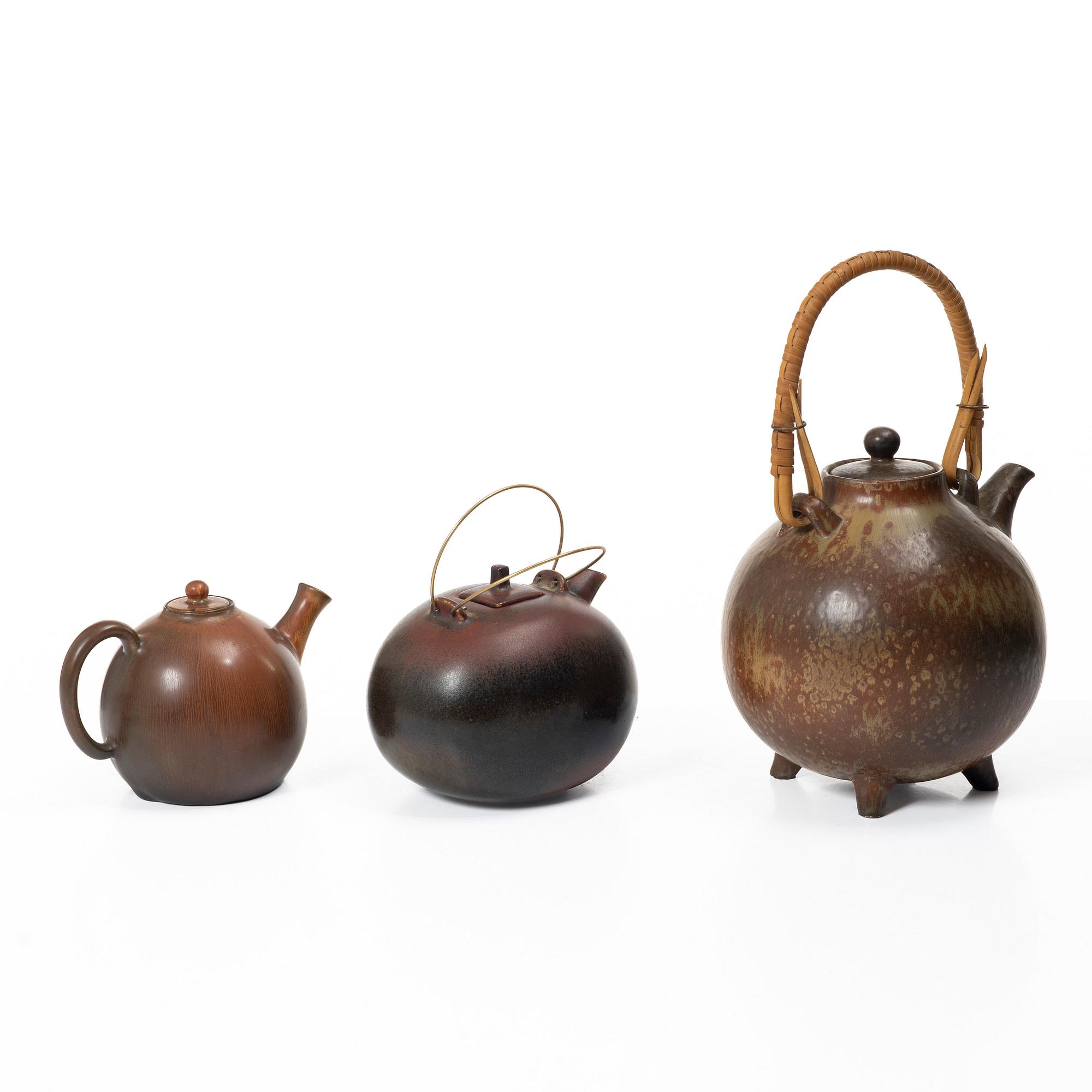 Gösta Grähs, , Gunnar Nylund and Carl-Harry Stålhane, three stoneware teapots, Rörstrand.