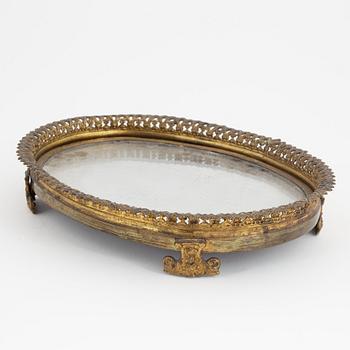 An late Empire gilt brass mirrored plateau, mid part of the 19th Century.