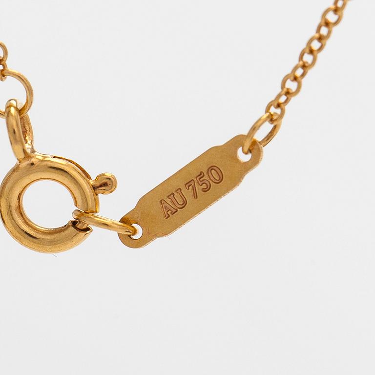 Tiffany & Co, an 18K gold 'Atlas Key' pendant with chain.