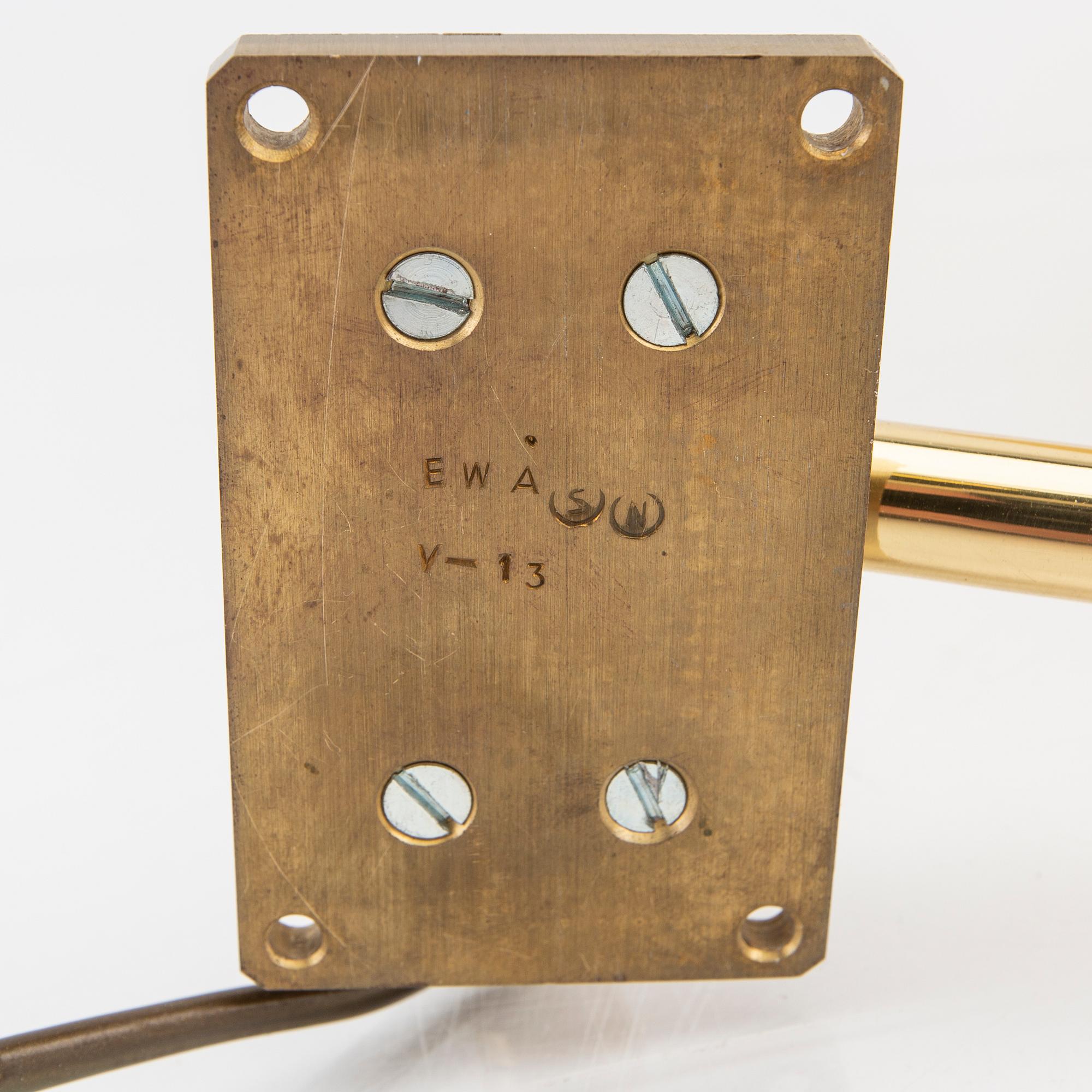 A pair of Evå wall lamps late 20th century.
