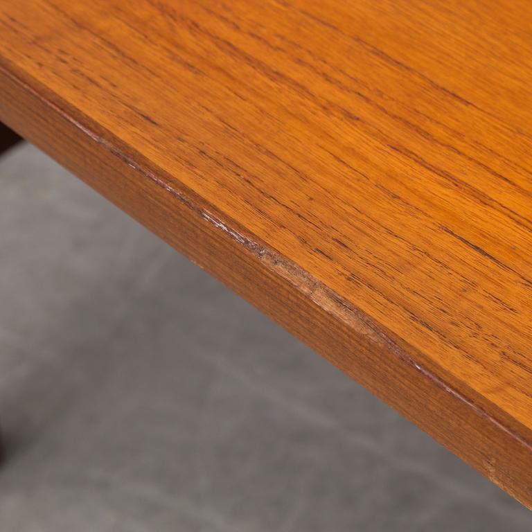 a late 20th century teak table.