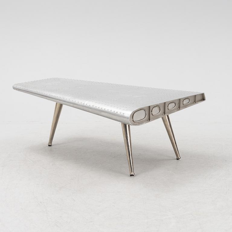 A coffee table constructed by a plane wing, second half of the 20th Century.