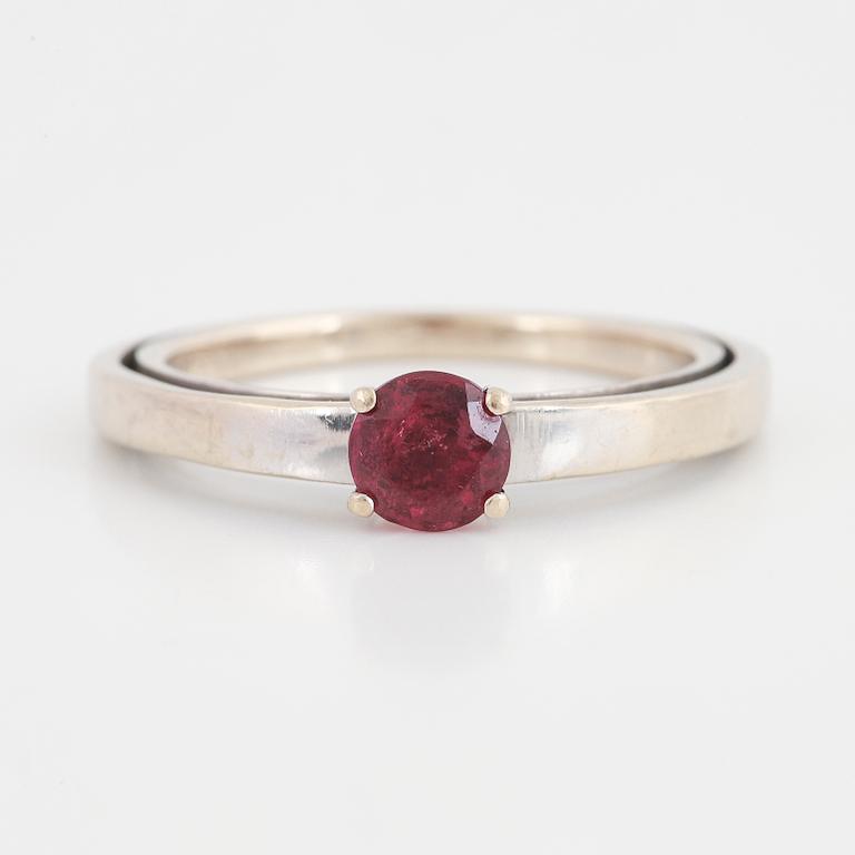 A tourmaline and brilliant cut diamond ring.