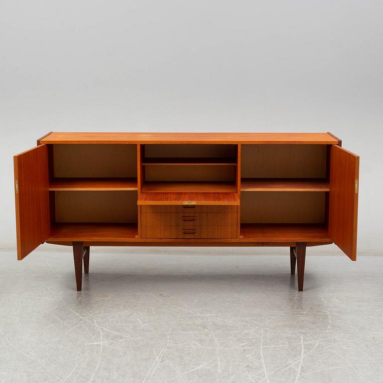 A second half of the 20th century teak veneered sideboard.