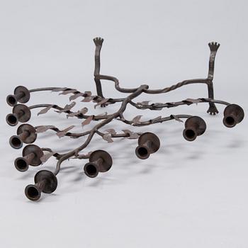 Paavo Tynell, A wrought iron floor candelabrum, oy Taito ab, dated 1926.