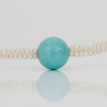 A seed pearl and turquoise bead necklace.