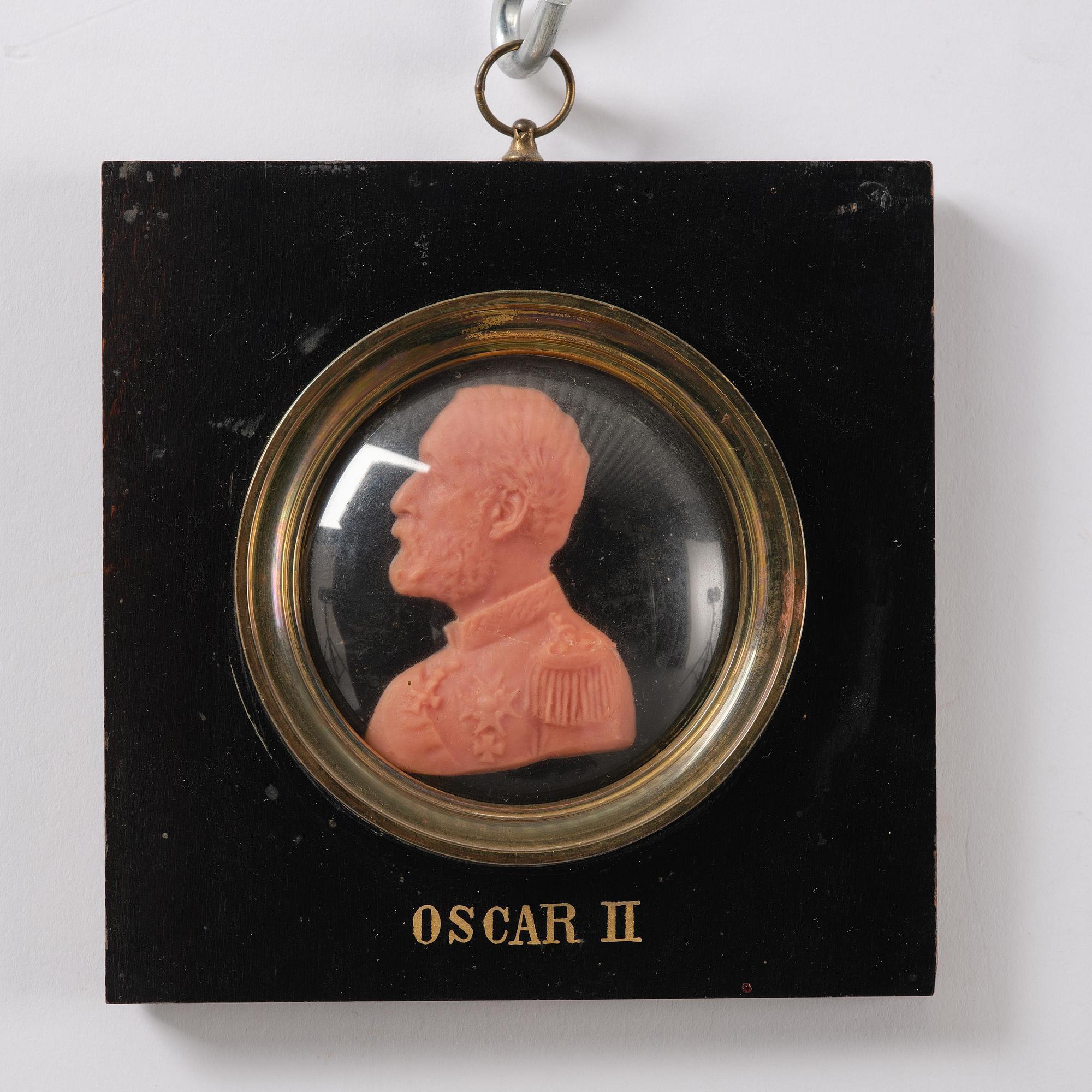 A set of twenty wax portraits of Swedish monarchs, late 19th century.