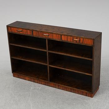 A 1930's stained birch bookshelf.