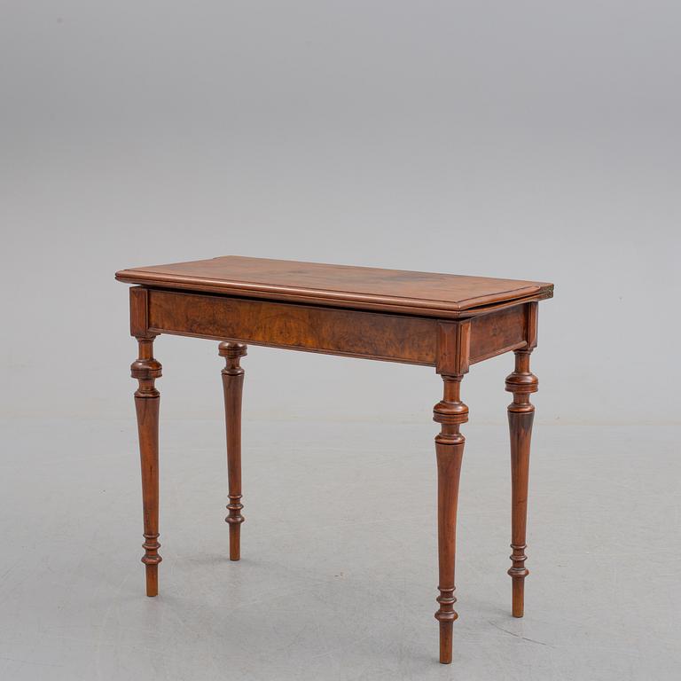 A late 19th century mahogany card table.