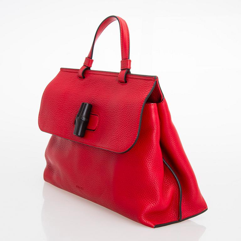 Gucci, a 'Bamboo Daily Top Handle' bag.
