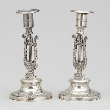LJUSSTAKAR, ett par, silver, Petter Adolf Sjöberg, Stockholm 1828. Empire.