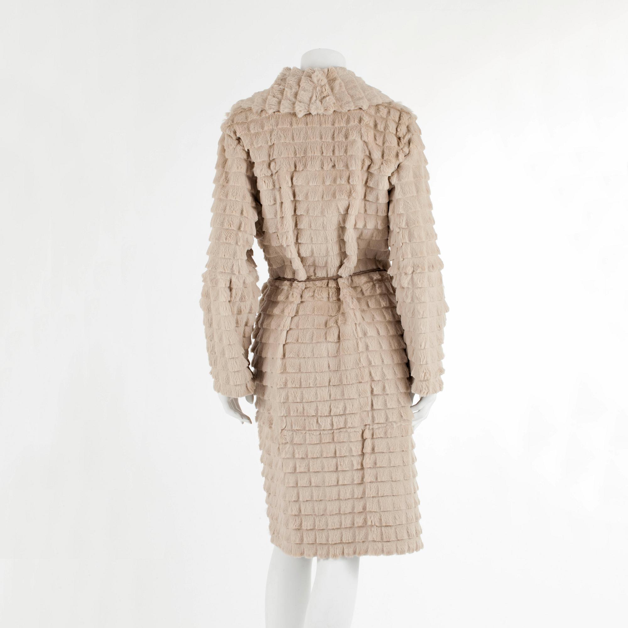 BROR AXEL PETERSEN, a beige rabbitfur coat. Size M.