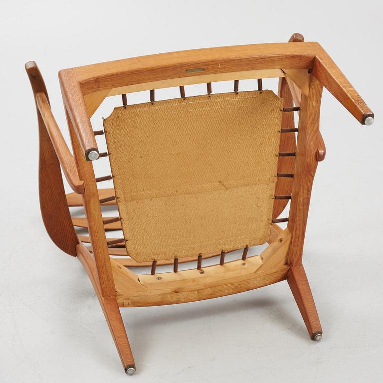 Carl Malmsten, a "Stora Fjäderbrickan" armchair, mid 20th century.