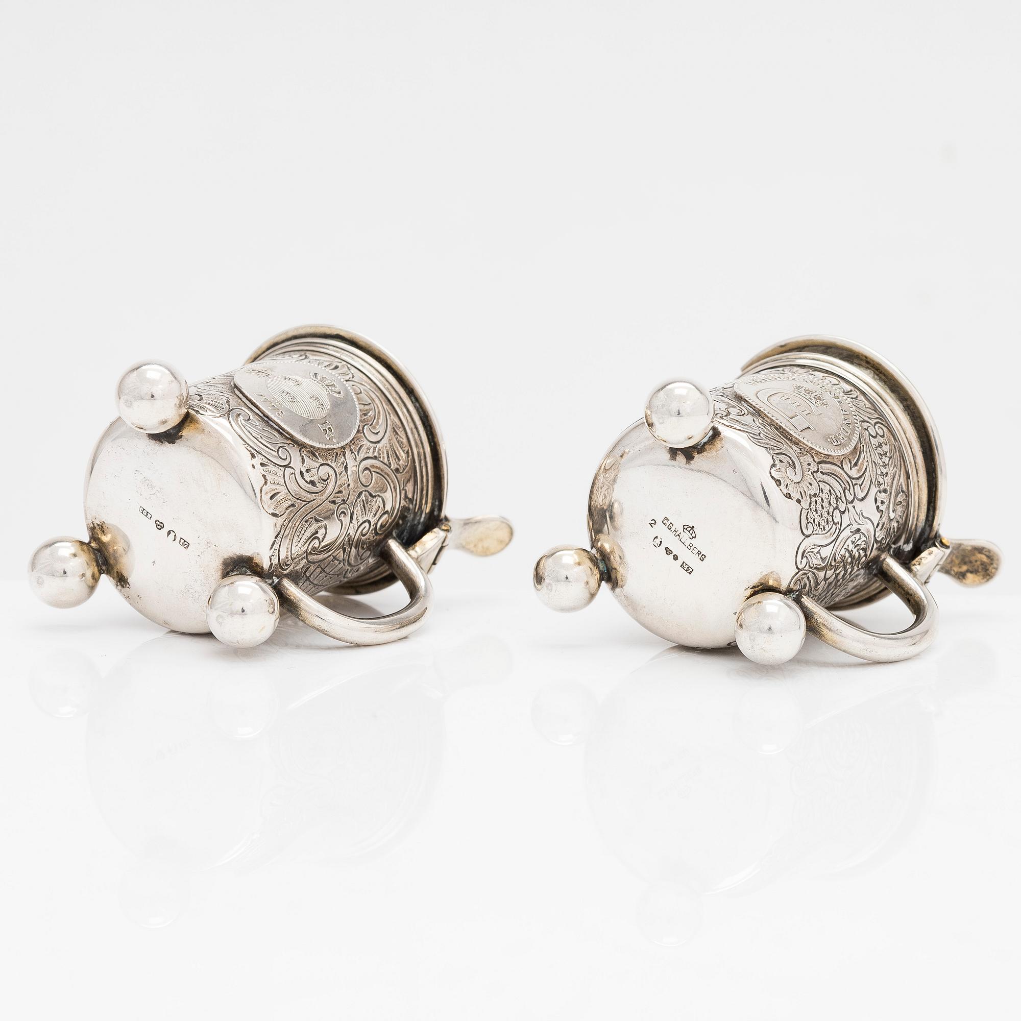 A pair of silver salt and mustard tankard,  C.G. Hallberg, Stockholm 1911 and 1914.