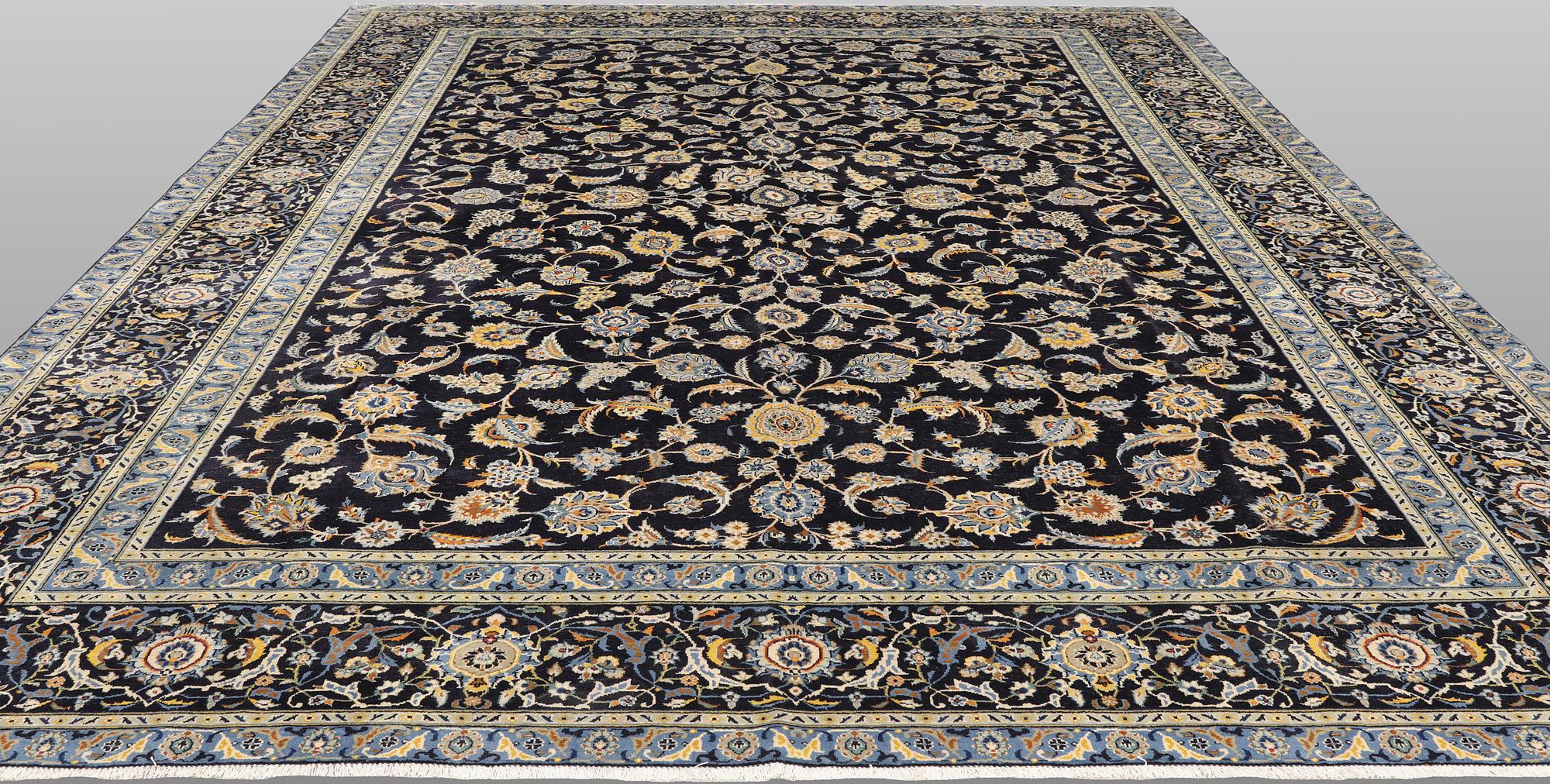 A Keshan carpet, approx. 440 x 308 cm.